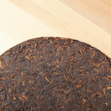 Pu-erh ripened cake Ban-Na stone compressed-2014