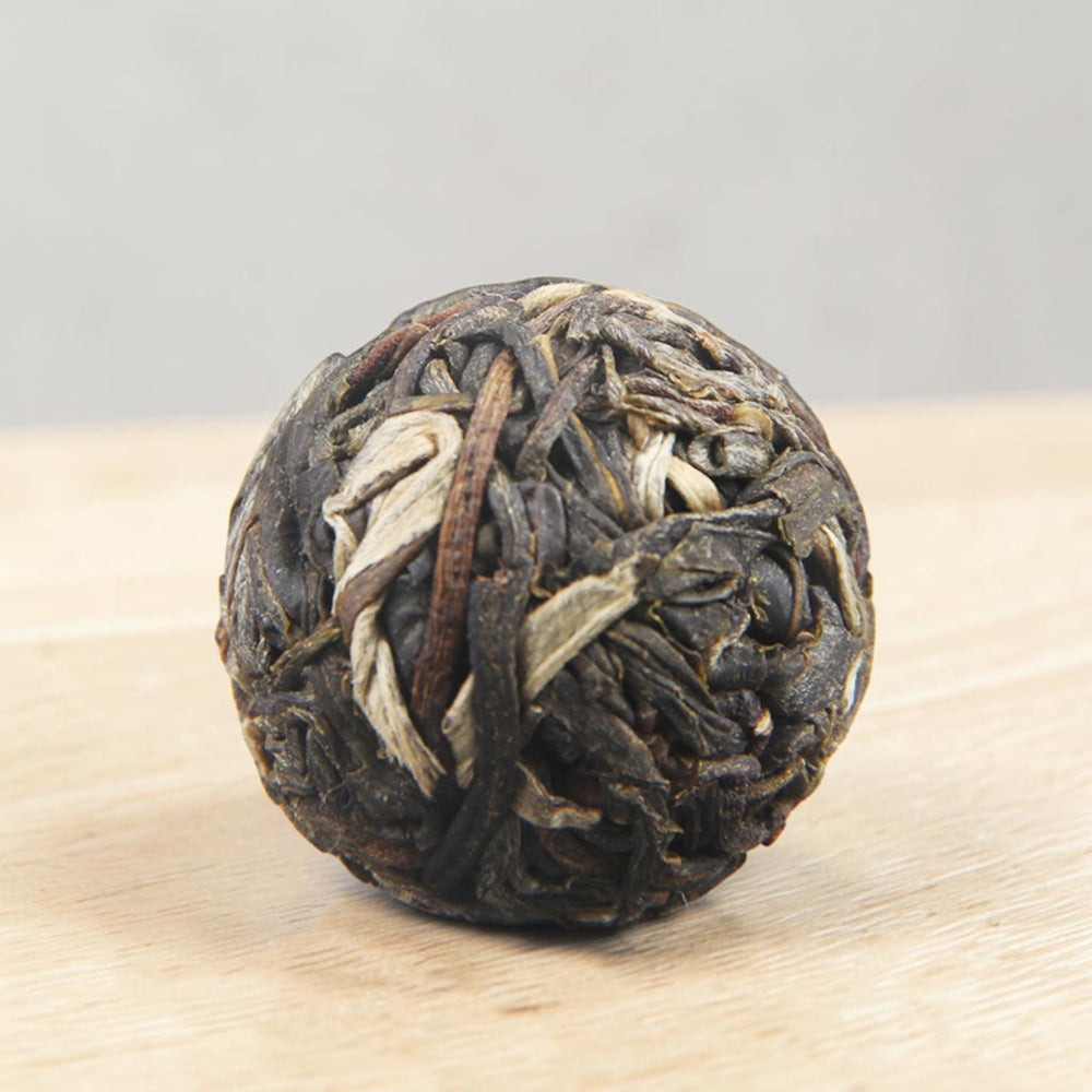 Pu-erh tea raw dragon pearl Bing Dao