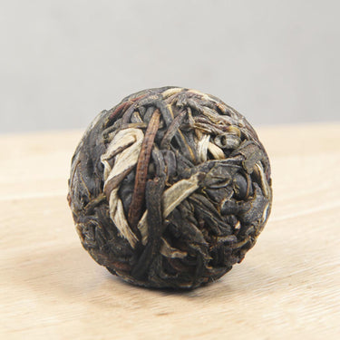 Pu-erh tea raw dragon pearl Bing Dao