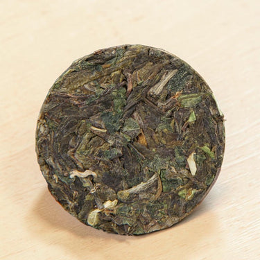 Pu-erh mini raw cake glutinous rice