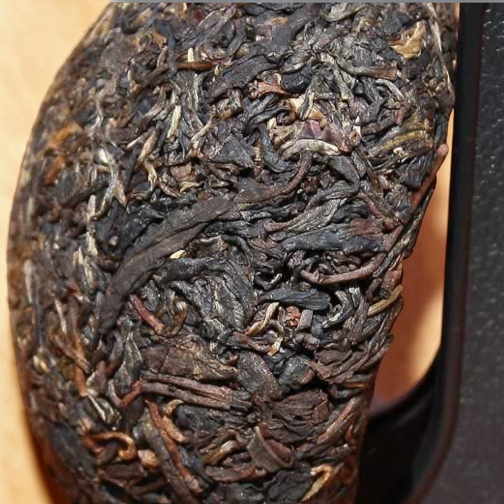 Pu-erh phoenix Tuo Cha 200g-2007