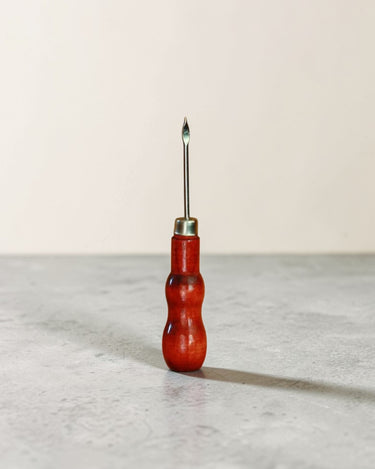 Pu-erh cake pin with wooden handle